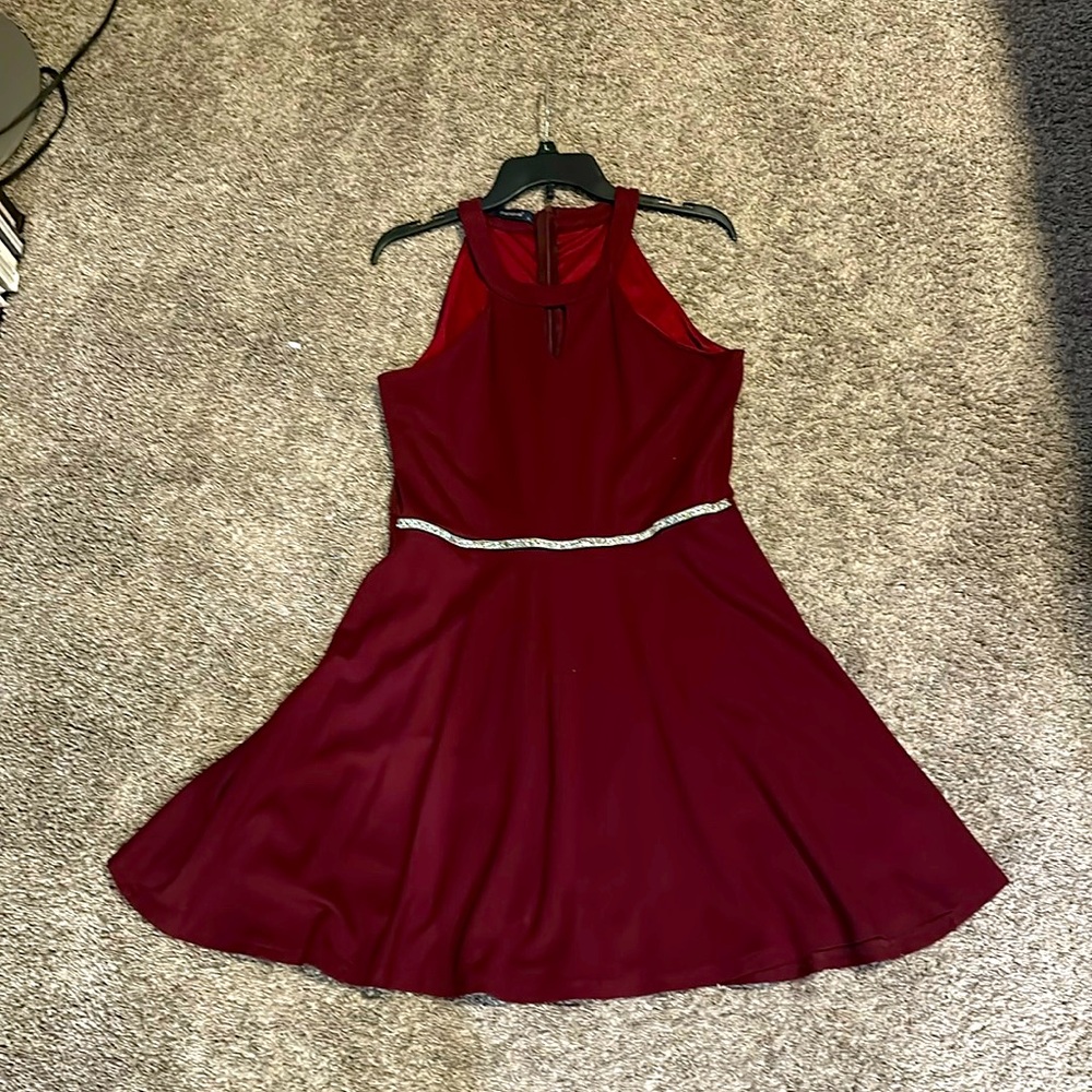 I am selling a formal short dress, a maroon color, very soft and comfortable!